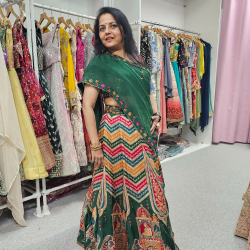 Jaina in a dress her boutique store